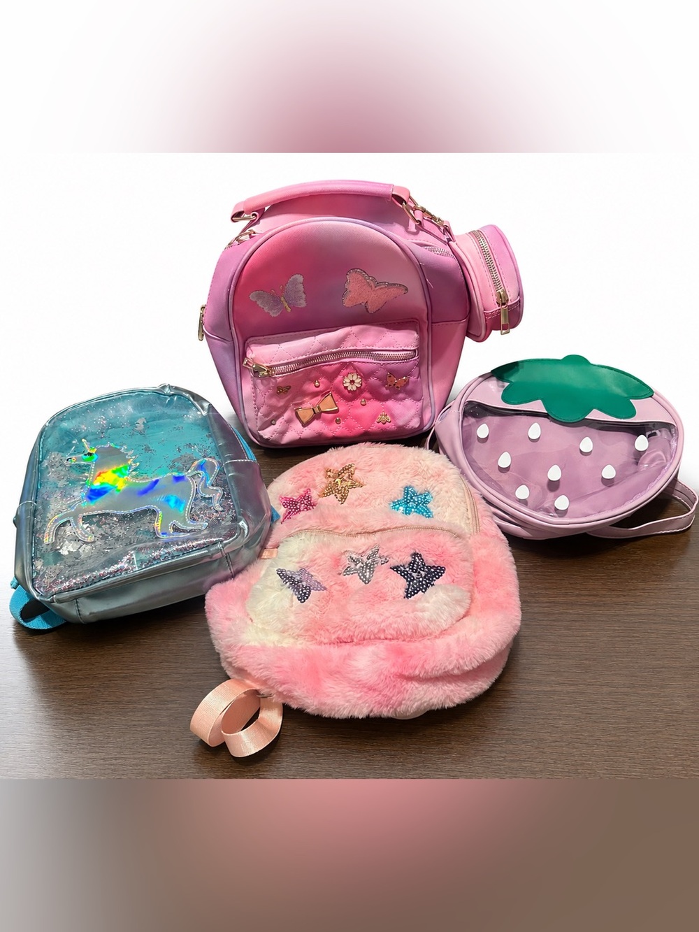 Bundle of 4 min-backpacks/purses